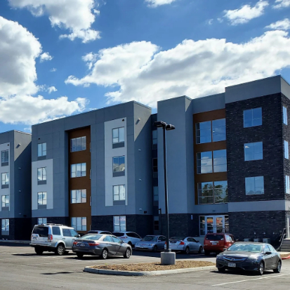 Residential or multi-family home exterior, clearly cleaned